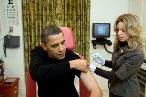 How does Obama receive health care when traveling abroad? 0