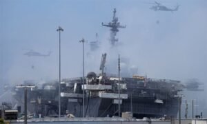 The US landing ship tilted due to firefighting water 3